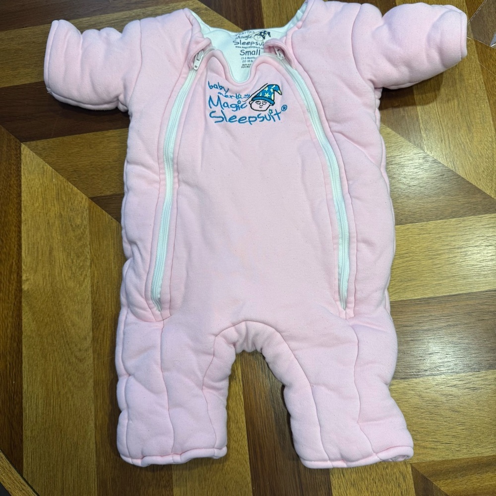 Baby Merlin’s Magic Sleepsuit Pink Sleep Sack flaw
